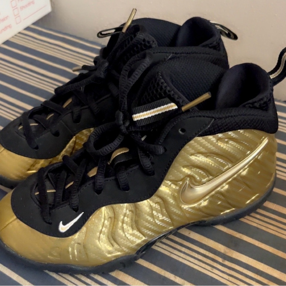 Nike Kids' Black and Gold Foamposite Sneakers